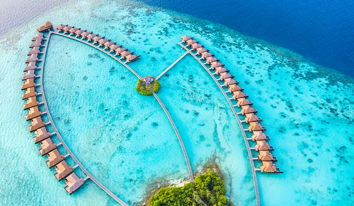 Aerial shot of Ayada Maldives Overwater Villas in azure waters
